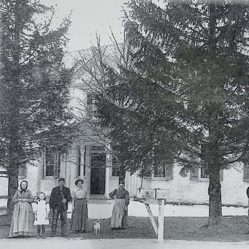 Klessig Family Outside of Saxonia House